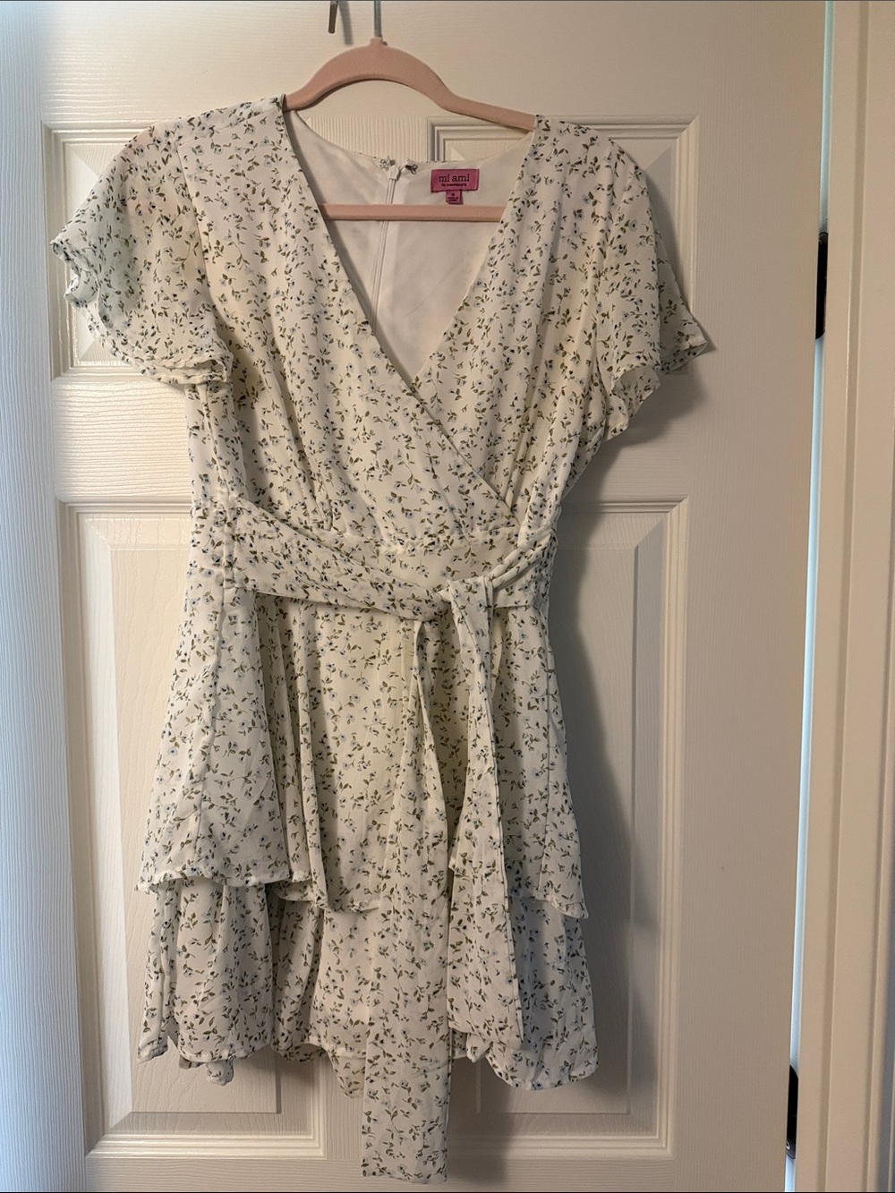 Francesca’s Cream Romper with Green & blue Floral Print
